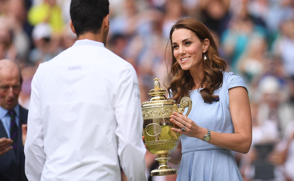 Novak Djokovic, pictured here being presented with the Wimbledon trophy by Catherine Duchess of Cambridge.