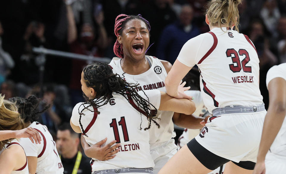 Aliyah Boston celebrates with her South Carolina teammates after beating Connecticut to win the 2022 NCAA women's basketball championship on April 3, 2022, at Target Center in Minneapolis. (Andy Lyons/Getty Images)