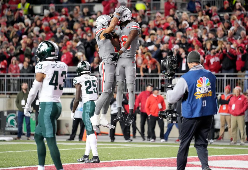 Ohio State receivers Marvin Harrison Jr. (18) and Emeka Egbuka (2) are projected to be picked in the first round of the NFL draft.