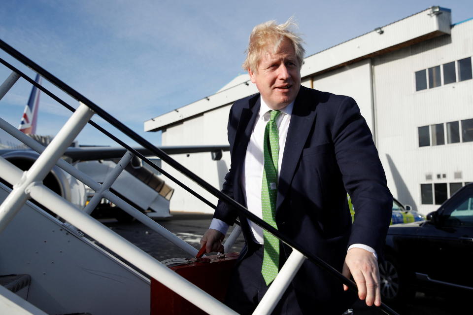 Prime Minister Boris Johnson boards an aircraft in London, for a flight to Kyiv, Ukraine as he holds crisis talks with Ukrainian president Volodymyr Zelensky amid rising tensions with Russia. Picture date: Tuesday February 1, 2022.
