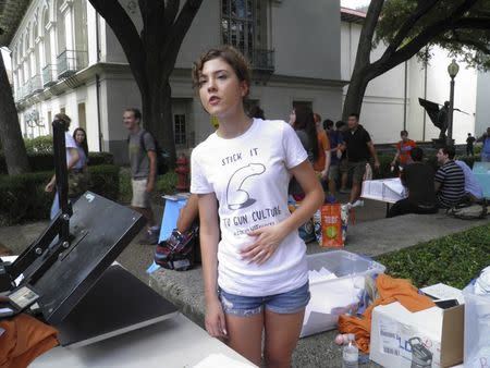 A University of Texas student attends a protest against a state law that allows for guns in classrooms at college campuses, in Austin, Texas, U.S. August 24, 2016. REUTERS/Jon Herskovitz