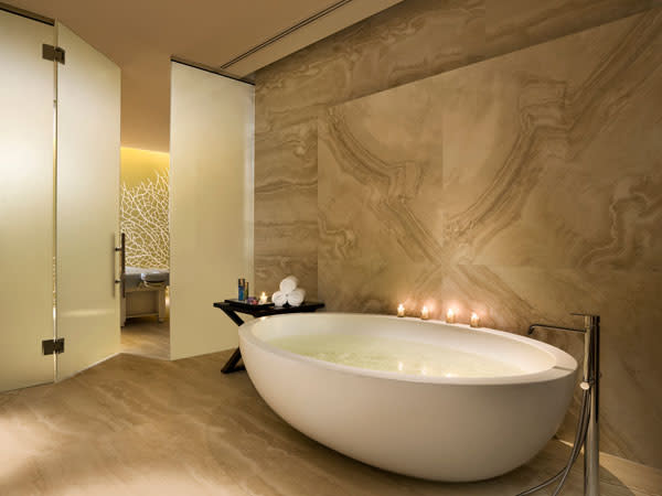 <div class="caption-credit"> Photo by: Courtesy The St. Regis</div><div class="caption-title">Couples In Need Of A Skin-Shape-Up</div><b>Where To Go:</b> Remède Spa at The St. Regis Bal Harbour Resort in Miami Beach, Florida <br> <b>What To Get:</b> Bal Harbour Restorative Gold Package. A spare-no-expenses, five-hour couples treatment involving a skin-smoothing body wrap with exfoliating sea salts and Hungarian moor mud; a 24-karat facial with gold-infused serum, scrub and oil; a hand-softening manicure and anti-aging pedicure, along with a set of gold-flecked products packed with healing and anti-inflammatory properties. <br> <b>What It Costs:</b> $1,575 per couple <br> <b><br> Read More: <br> <a rel="nofollow noopener" href="http://www.harpersbazaar.com/beauty/health-wellness-articles/mary-helen-bowers-ballet-beautiful-interview?link=emb&dom=yah_life&src=syn&con=blog_blog_hbz&mag=har" target="_blank" data-ylk="slk:Ballet Diet and Fitness Tips - That Work!;elm:context_link;itc:0;sec:content-canvas" class="link ">Ballet Diet and Fitness Tips - That Work!</a></b> <b><br> <a rel="nofollow noopener" href="http://www.harpersbazaar.com/beauty/health-wellness-articles/fitness-diaries-get-fit-fast-0612?link=emb&dom=yah_life&src=syn&con=blog_blog_hbz&mag=har" target="_blank" data-ylk="slk:Steps to Get Fit in Four Weeks;elm:context_link;itc:0;sec:content-canvas" class="link ">Steps to Get Fit in Four Weeks</a></b>