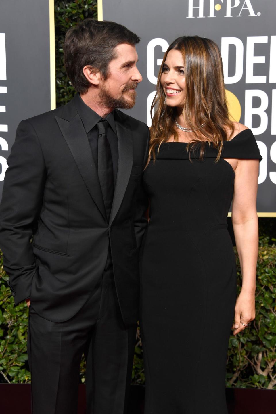 Loved up: Christian Bale and wife Sibi Blazic (Frazer Harrison/Getty Images)