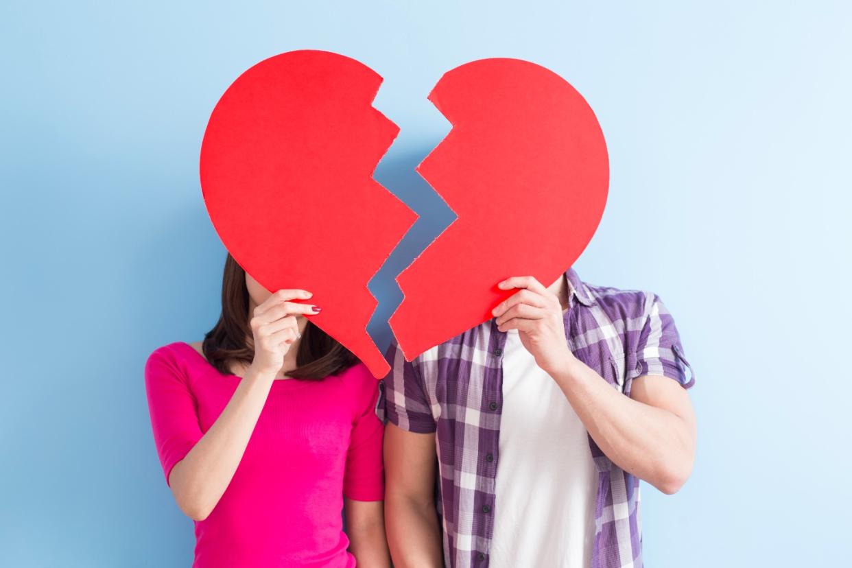 A young couple in a situationship hold a broken heart