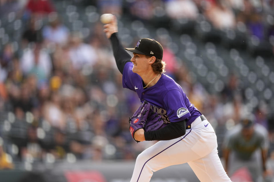 Colorado Rockies starting pitcher Ryan Feltner works against the Pittsburgh Pirates during the first inning of a baseball game Friday, June 14, 2024, in Denver. (AP Photo/David Zalubowski)