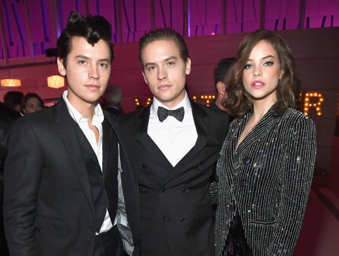 the two brother with barbara at an event