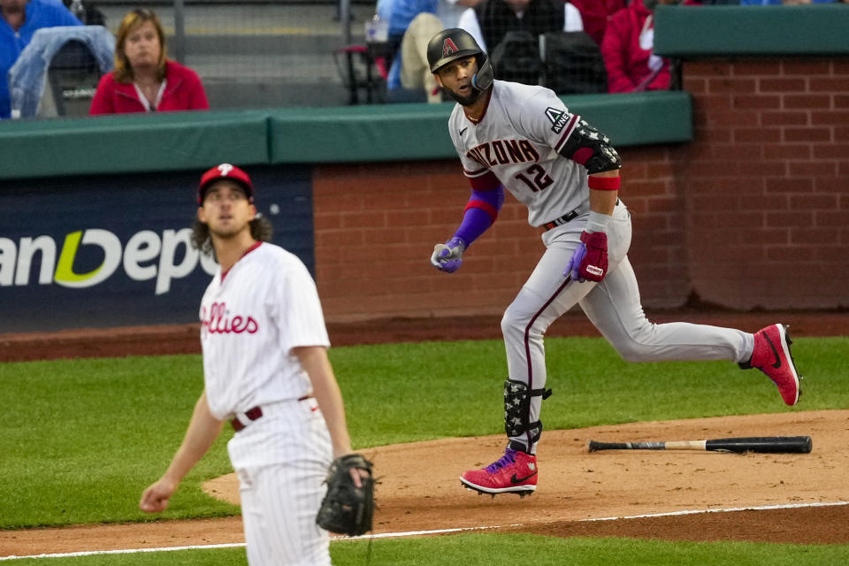 Arizona Diamondbacks' Lourdes Gurriel Jr. hits a home run off Philadelphia Phillies starting pitcher Aaron Nola during the second inning in Game 6 of the baseball NL Championship Series in Philadelphia Monday, Oct. 23, 2023. (AP Photo/Matt Rourke)