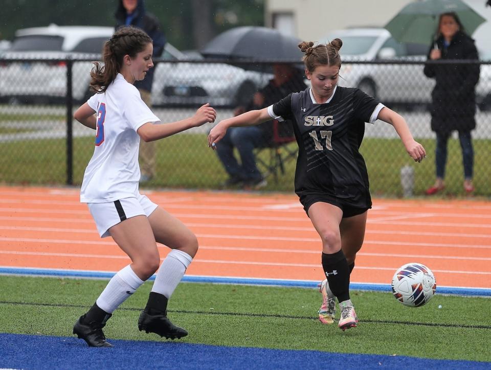 Sacred Heart-Griffin's Hannah Lambert works against Pleasant Plains' Sophia Taft during the first half of the Class 1A Riverton Sectional girls soccer final on Friday, May 19, 2023. Plains won 1-0.