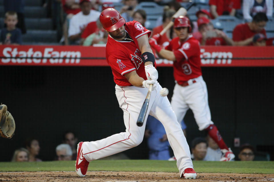 Albert Pujols mashes two home runs Thursday to tie Ken Griffey Jr. on the all-time home run list. (AP Photo)