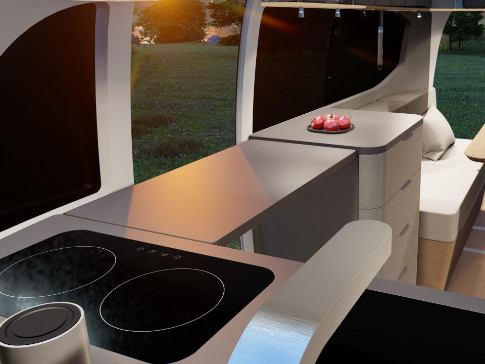 A rendering of the interior of the Airstream Studio F. A. Porsche Concept Travel Trailer.