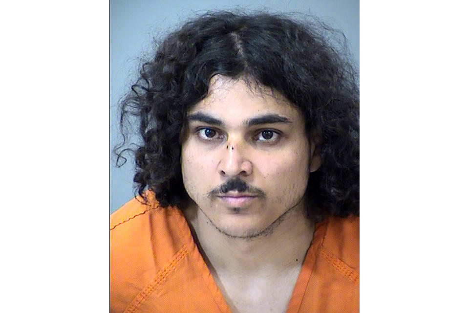 This photo provided by the Maricopa County, Ariz., Sheriff’s Office shows Raad Almansoori, who is a suspect in the bludgeoning death of a woman in a New York City hotel and was charged Wednesday, Feb. 21, 2024, in connection with attacks on two women in Arizona’s largest county. Almansoori was formally charged with two counts each of attempted murder, aggravated assault and attempted sexual assault and one count of theft of means of transportation. (Maricopa County Sheriff’s Office via AP)