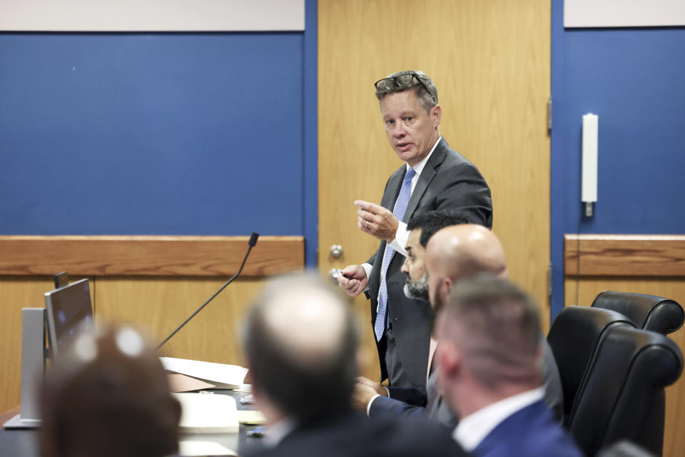 Attorney Brian Rafferty (right), who is defending Sidney Powell, argues before Fulton County Superior Judge Scott McAfee. McAfee is hearing motions from attorneys representing Ken Chesebro and Sidney Powell in Atlanta on Wednesday, Sept. 6, 2023. (Jason Getz/Atlanta Journal-Constitution via AP, Pool)