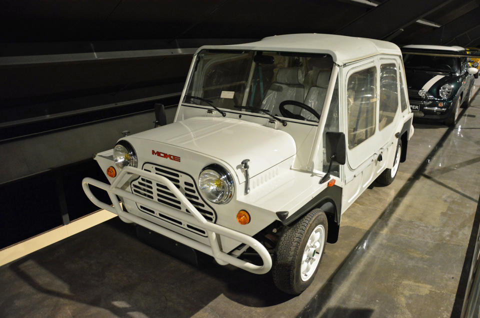 <p>The Sheikh has several variations of the <strong>Mini</strong> in his collection and none are rainbow-themed. This Moke is in <strong>near-new condition</strong> as evidenced by the plastic wrappers still on the seats. The yellow headlight bulbs suggest it was sold new on the French market. The collection also includes an Italian-built, Innocenti-badged Mini Cooper, a late-model Rover Mini Convertible and a first-generation BMW Mini.</p>