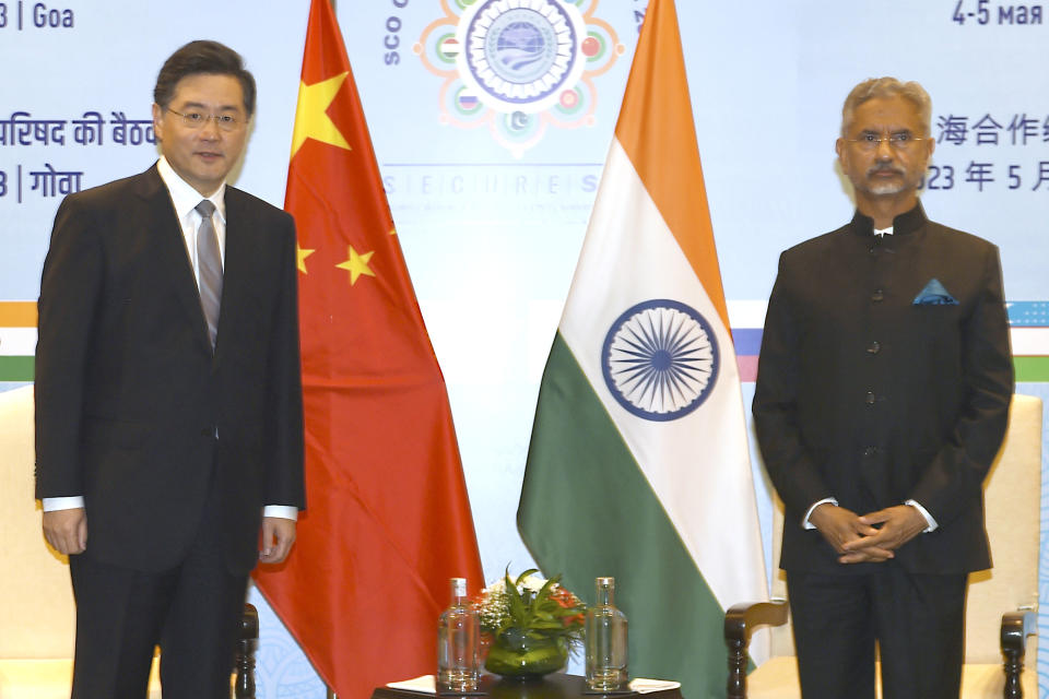 In this photo released by China's Xinhua News Agency, Chinese Foreign Minister Qin Gang, left, and India's Foreign Minister S. Jaishankar meet on the sidelines of the Shanghai Cooperation Organization (SCO) foreign ministers' meeting in Goa, India, Thursday, May 4, 2023. (Javed Dar/Xinhua via AP)