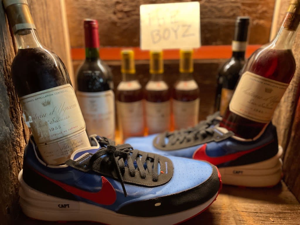 Vintners member Mark Robbins created customized wine sneakers for members to wear when sipping vino. Mark Robbins