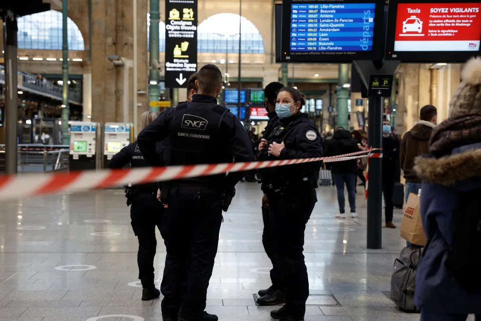 French police secure the scene after French police killed a person who attacked them with a knife at Gare du Nord station in Paris, France, February 14, 2022. REUTERS/Benoit Tessier