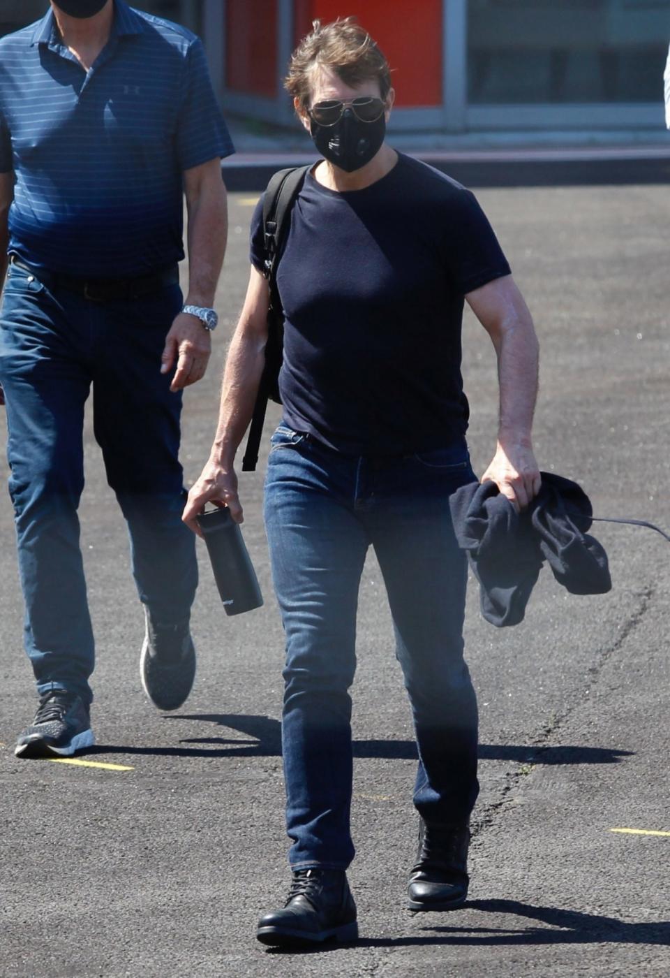 <p>Tom Cruise is seen wearing a face mask in London as he prepares to resume filming on <i>Mission: Impossible 7</i> on Tuesday. </p>