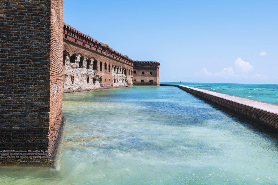 A fortress surrounded by blue water