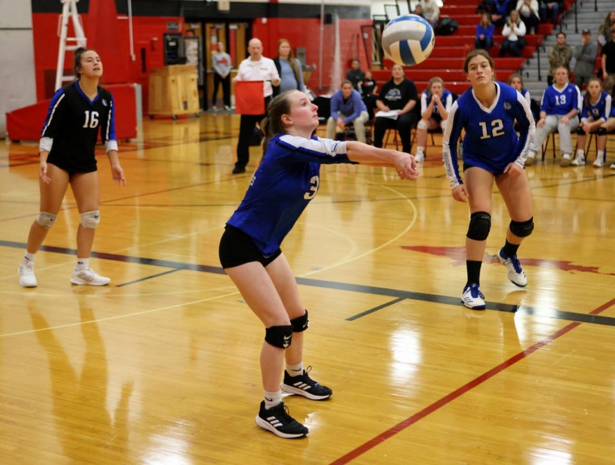 Inland Lakes senior KC Cain (3) awaits a ball while senior teammates Ryann Clancy (16) and Natalie Wandrie (12) look on during Tuesday's MHSAA Division 4 volleyball quarterfinal matchup against Crystal Falls Forest Park in Marquette.