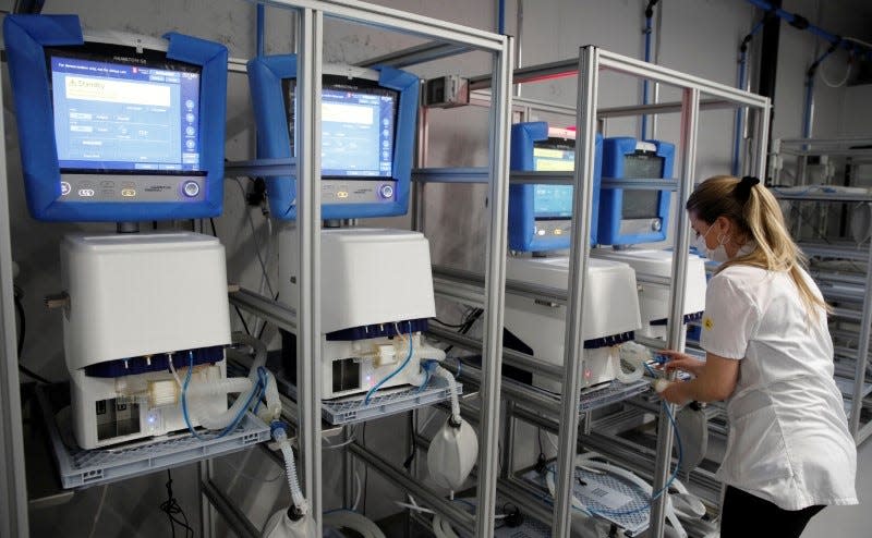 An employee of Hamilton Medical AG tests ventilators at a plant in Domat/Ems, Switzerland March 18, 2020. REUTERS/Arnd Wiegmann