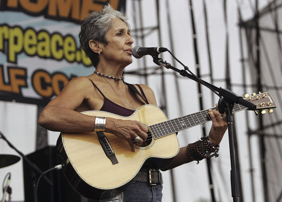 FILE - Peace activist and singer Joan Baez performs on the National Mall in conjunction with anti-war demonstration in Washington on Sept. 24, 2005. Baez is the subject of a documentary titled, "Joan Baez: I Am a Noise." (AP Photo/Pablo Martinez Monsivais, File)