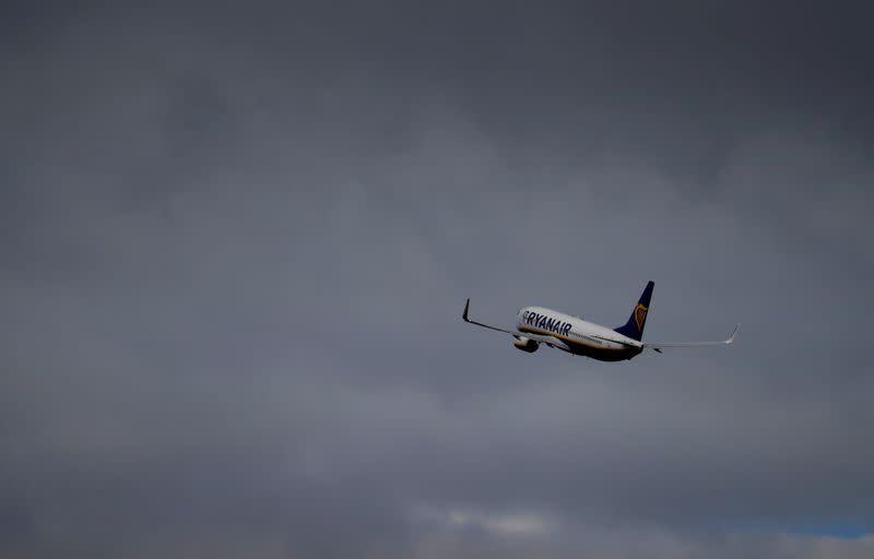 FILE PHOTO: A Ryanair plane takes off from Manchester Airport as the spread of the coronavirus disease (COVID-19) continues in Manchester