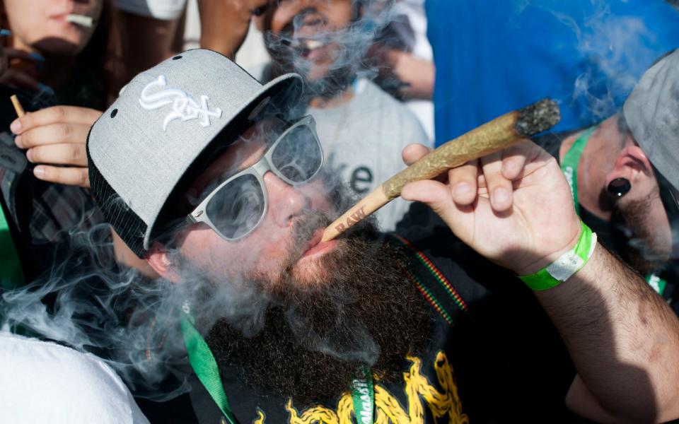 The 4/20 cannabis festival in Denver, Colorado, celebrating the legalisation of the drug - Credit: AFP