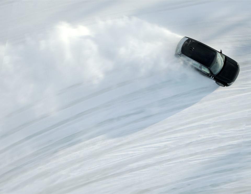 a pair of sunglasses on a snowy mountain