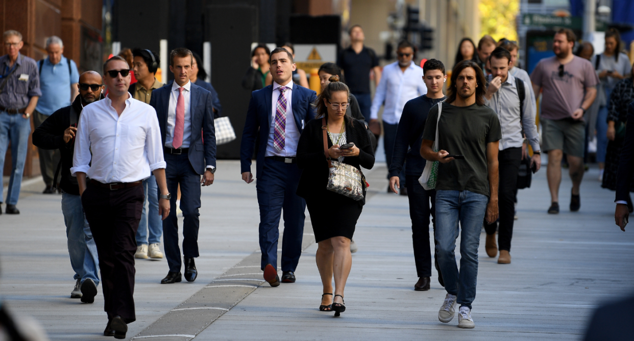 Australian workers walking in the city. Work and annual leave concept.