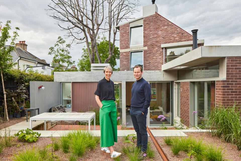 Will and Sam Burges in the garden of Six Columns, their self-build home in Crystal Palace (Juliet Murphy Photography)