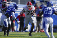 Georgia running back Kendall Milton (22) runs with the ball during the first half of an NCAA college football game against Kentucky, Saturday, Oct. 31, 2020, in Lexington, Ky. (AP Photo/Bryan Woolston)