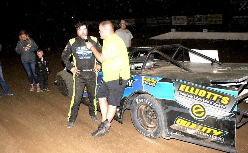 Dillon Nusbaum is interviewed in the Winner’s Circle after taking home the victory in the MAGA Lift UMP Modified Division
