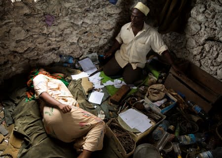 The Wider Image: Tanzania's Zanzibar begins to register traditional healers