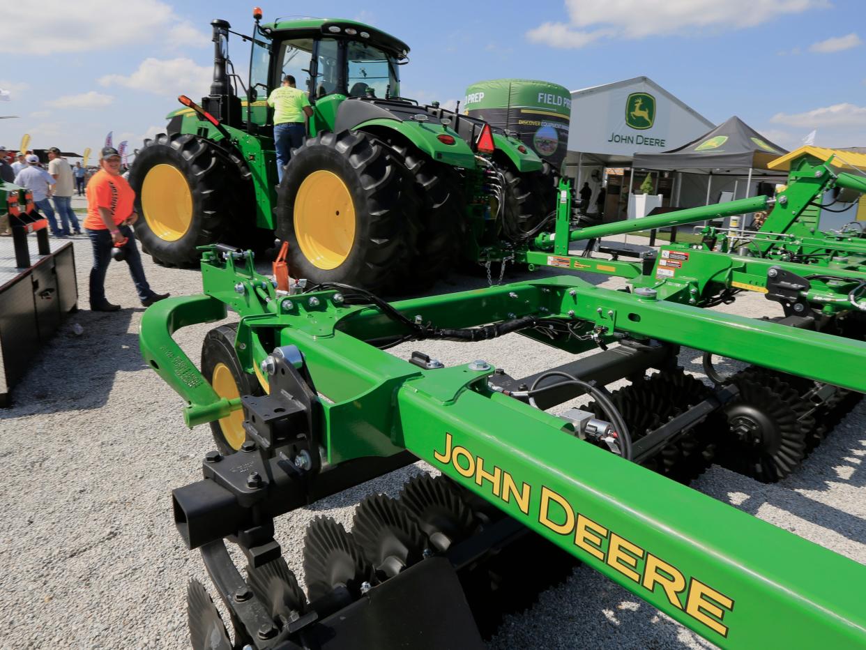 In this Sept. 10, 2019, file photo a John Deere tractor is on display at the Husker Harvest Days farm show in Grand Island, Neb.