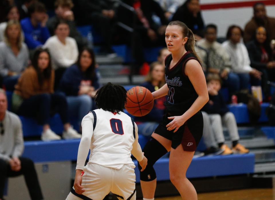 Pikeville’s Trinity Rowe brings the ball up court against Sacred Heart’s Amirah Jordan Saturday afternoon in Louisville.
Feb. 17, 2024