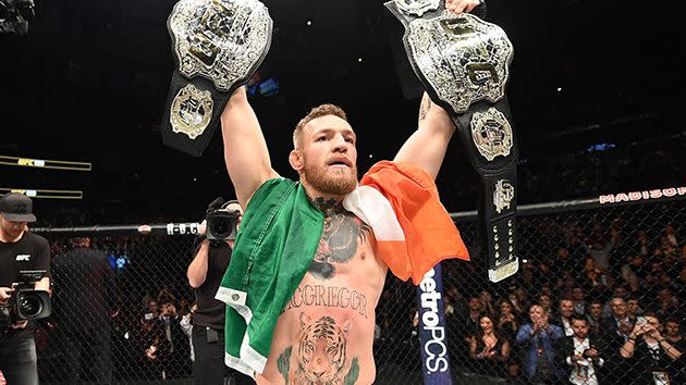 McGregor with his two belts. Image: Getty