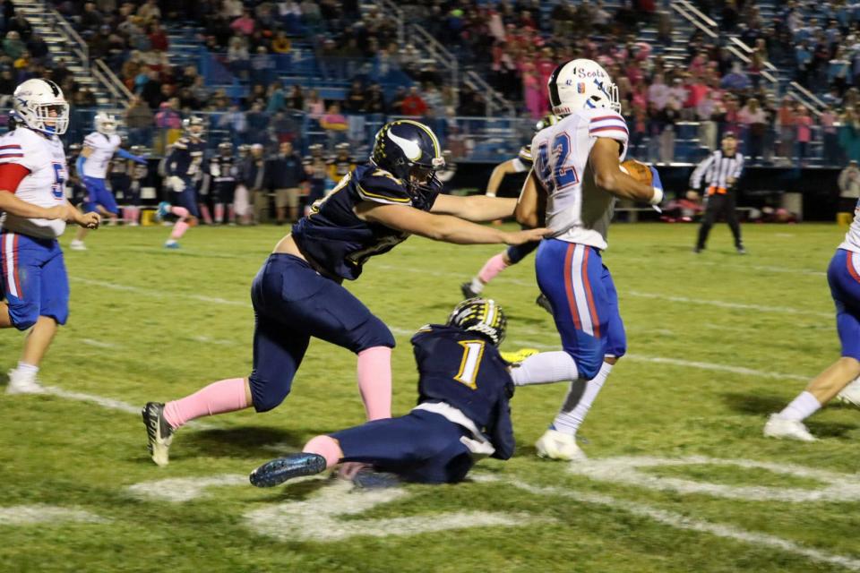 Highland running back Dane Nauman runs for yards at River Valley this season. The junior was named Ohio's Division V Offensive Player of the Year.