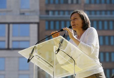 Catalan National Assembly (ANC)'s President Carme Forcadell speaks during a Catalan pro-independence demonstration at Catalunya square in Barcelona October 19, 2014. REUTERS/Albert Gea