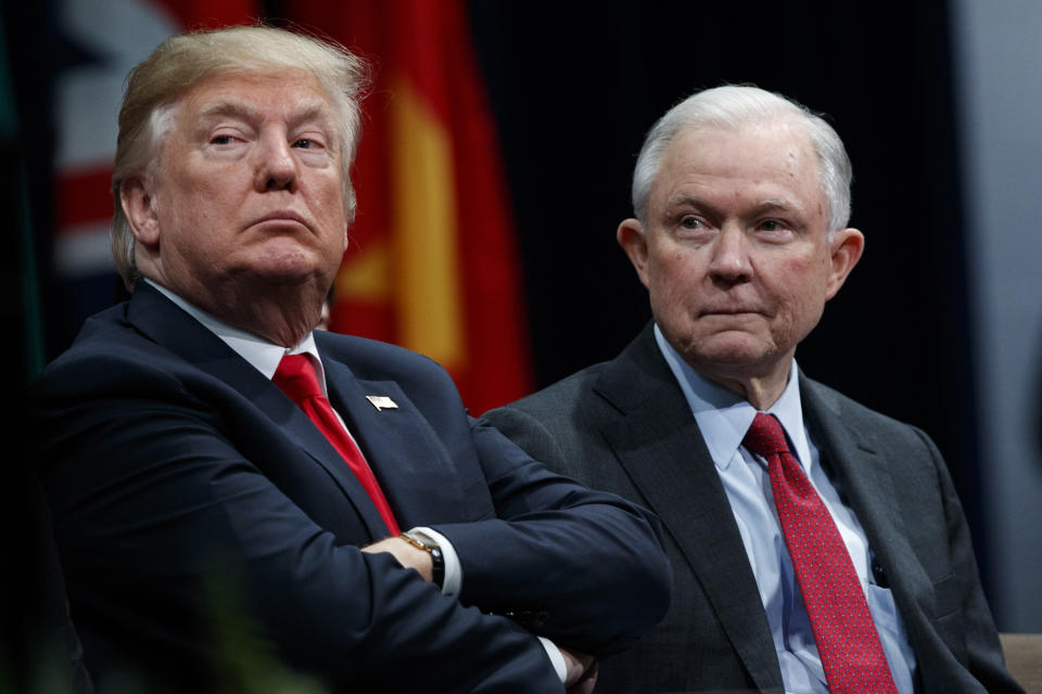 President Trump and Attorney General Jeff Sessions at the FBI National Academy graduation ceremony in Quantico, Va., in December 2017. (Photo: Evan Vucci/AP)