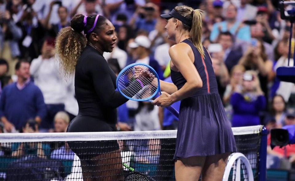  Serena Williams (left) shakes hands with Maria Sharapova after their first-round match at the U.S. Open tennis tournament in New York, August 2019. | Charles Krupa/Shutterstock