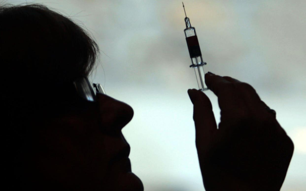 A study from the University of Texas suggests getting the jab could cut the chance of developing the condition by 17 per cent - PA