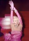 <p>One of Marilyn Monroe's most famous looks (of many) was in <em>Gentlemen Prefer Blondes</em>. During her rendition of "Diamonds Are a Girl's Best Friend," the actress—dripping in diamonds, of course—rocked a hot-pink strapless evening gown with matching gloves.</p>