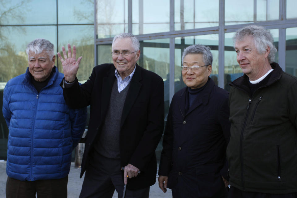 Pacific Century Institute Chairman Donald Gregg, second left, and his party arrive at Pyongyang Airport in Pyongyang, North Korea, Monday, Feb. 10, 2014. Gregg, a former U.S. ambassador to South Korea, arrived in Pyongyang on Monday with representatives of the Pacific Century Institute, a private U.S. group. Gregg, who is chairman of the institute, wouldn't say what he hoped to discuss there. (AP Photo/Jon Chol Jin)