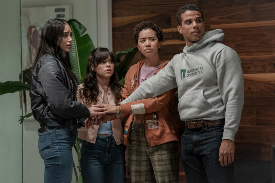 L-R: Melissa Barrera as Sam Carpenter, Jenna Ortega as Tara Carpenter, Jasmin Savoy Brown as Mindy Meeks-Martin, and Mason Gooding as Chad Meeks-Martin in <em>Scream VI</em><span class="copyright">Philippe Bossé—Paramount Pictures</span>