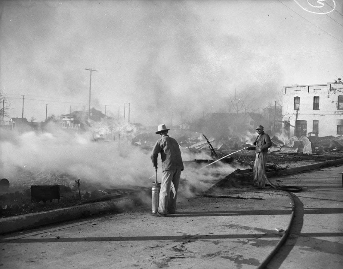 Dec. 5, 1941: Residents of Keller turned firefighters Friday afternoon when a grass fire started a blaze that destroyed a lumber yard, beauty shop, and hardware store. Two volunteers are fighting the flames with the hose that arrived from Roanoke, Texas and a hand extinguisher. Fort Worth Star-Telegram archives/UT Arlington Special Collections