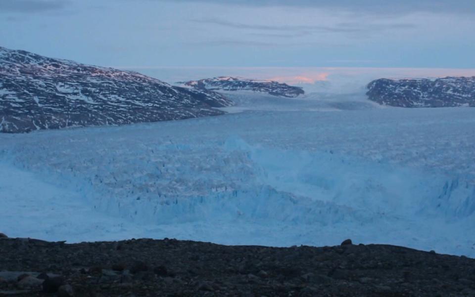 It only took 30 minutes for an iceberg nearly half the size of Manhattan to separate from a glacier in Greenland. <cite>Courtesy of Denise Holland/New York University</cite>