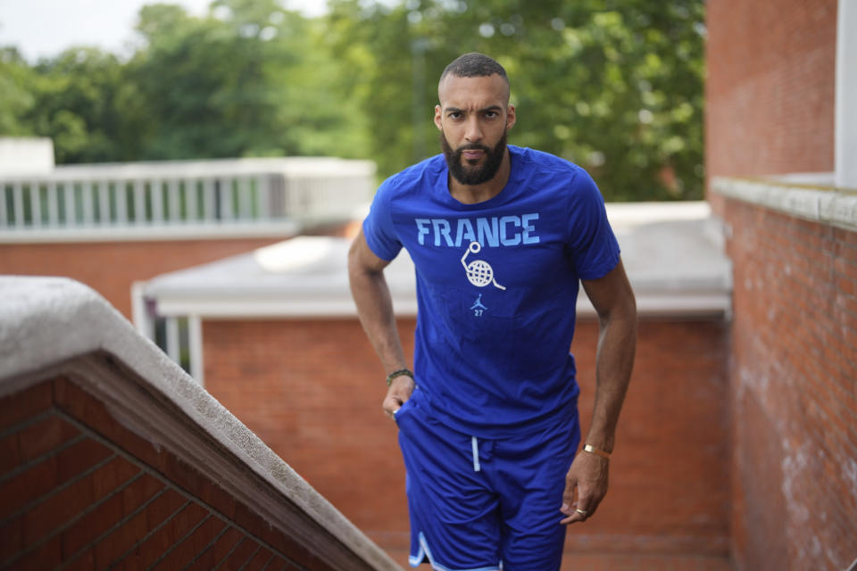 France's basketball player Rudy Gobert, who plays for the NBA Minnesota Timberwolves, arrives to give a press conference during media day at the French National Institute of Sport and Physical Education, in Vincennes, outside Paris, Thursday, June 27, 2024. (AP Photo/Thibault Camus)