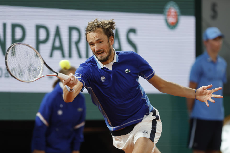 Russia's Daniil Medvedev returns the ball to Croatia's Marin Cilic during their fourth round match of the French Open tennis tournament at the Roland Garros stadium Monday, May 30, 2022 in Paris. (AP Photo/Jean-Francois Badias)