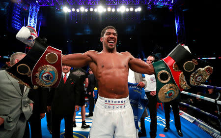 Boxing - Anthony Joshua v Alexander Povetkin - WBA Super, IBF, WBO & IBO World Heavyweight Titles - Wembley Stadium, London, Britain - September 22, 2018 Anthony Joshua celebrates his win against Alexander Povetkin Action Images via Reuters/Andrew Couldridge