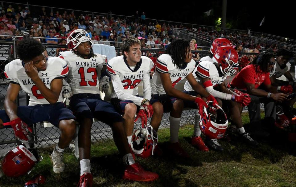 Manatee High players watch the action in Venice on Friday, Oct. 6, 2023.